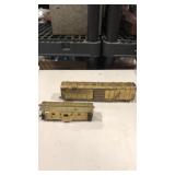 2 brass color railroad train car models