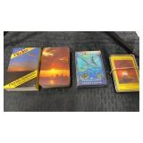 2 opened decks of cards and 1 sealed deck of