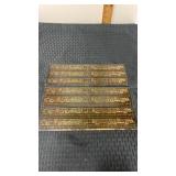 Photo etched train parts on metal plaques