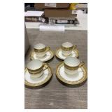 Limoges tea cups and saucers with gold rim