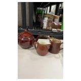 Stoneware tea pot and 2 creamer cups
