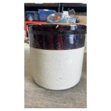 7.5ï¿½ tall. 2 tone stoneware crock some flaws