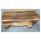 Paula seen pig cutting board  approximately  21.5