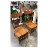 Two matching wooden chairs