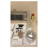 Lot of medical beakers and more