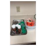 Metal tray with alcohol , biohazard stickers and