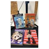 4 miscellaneous paper back books /comics  model,