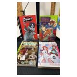 4 miscellaneous paper back books /comics death at