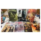 7. Silent hill comic books    5 are in plastic
