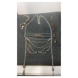 Ladies silvertone necklace and 2 bracelets o