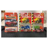 2 new on card Tonka 1953 wrecker and 1949 utility