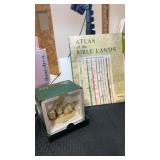 Atlas of the Bible lands book and Snowbaby