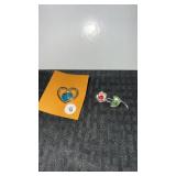 Silver tone flower pin and gold tone heart pin