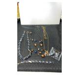 Group of costume necklaces and more