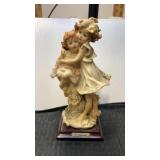 G Armani  capidimonte Italy hugging sisters,