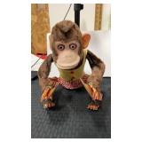 Vintage battery operated, jolly chimp plays the