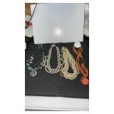 4 costume jewelry necklaces