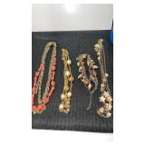 Gold tone costume necklaces and bracelet