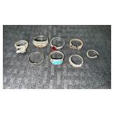 8 silver tone womanï¿½s rings