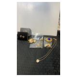 Miscellaneous gold tone womanï¿½s jewelry  brooch,