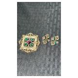 Ladies gold tone brooch and matching earrings