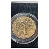Kapok tree inn founded 1957 commemorative metal