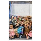 Group of mini dolls container not included