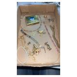 Miscellaneous gold tone woman's jewelry.