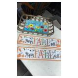 Metal fall sign and spring flowers basket