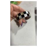 Checkerboard cuff bracelet in laid with black