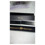 Ladies  sovereign gold tone band, oval-shaped