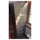 4 drawer metal. file cabinet  approximately  51.5