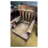 Wooden rocking chair.  IN BASEMENT