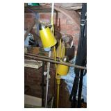 Vintage floor lamp with miscellaneous items in