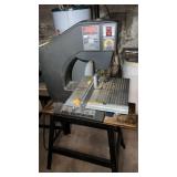 SKIL 10 inch motorized bandsaw on stand in