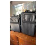 2 Lewis, and Hyde original suitcases on wheels