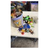 Popcorn tin full of miscellaneous opened happy