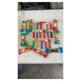 26 PEZ Candy dispensers.  A few are still in