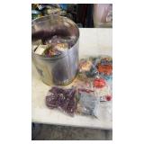 Popcorn tin full of miscellaneous unopened happy