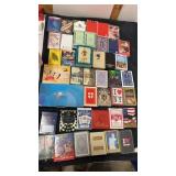 40 miscellaneous decks of playing cards. Some are