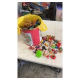 Popcorn tin full of miscellaneous opened happy