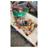 Dog food tin full of miscellaneous opened happy