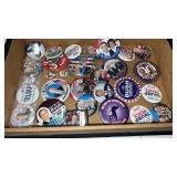 Group of political pins