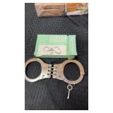 Handcuffs with key on original box