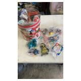 Popcorn tin full of miscellaneous unopened happy