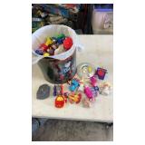 Popcorn tin full of miscellaneous opened happy