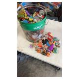 Dog food tin full of miscellaneous opened happy