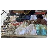 Group of womanï¿½s dress clothes , shorts and more.