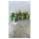 10 green multicolored marbles