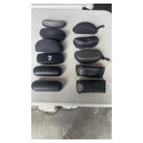 11 misc. glasses & sun glass cases. Oakley, Ray